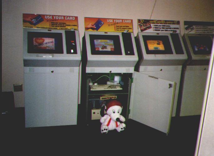 Snoopy examines a kiosk